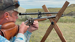 Pat Dulin takes careful aim and scores with a good shot.